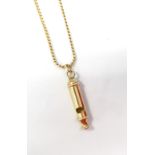 EIGHTEEN CARAT GOLD NECK CHAIN with nine carat gold whistle pendant,