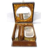 GEORGE V SILVER GENTLEMAN'S TRAVELLING GROOMING SET comprising a circular mirror with stand, comb,