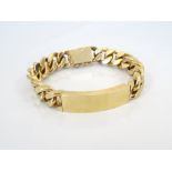 HEAVY NINE CARAT GOLD IDENTITY BRACELET the blank identity panel within curb link chain,