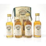 BOWMORE MINIATURE SET A set of four Bowmore Single Malt Scotch Whisky miniatures,