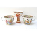 PAIR OF 19th CENTURY CHINESE PORCELAIN TEA CUPS with handpainted figural decoration to outer body,