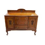 MAHOGANY BOW FRONT SIDEBOARD with a carved, shaped and raised back,