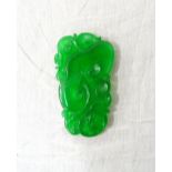 CHINESE CARVED JADE PENDANT with bat and pierced decoration, 6.3cm x 3.