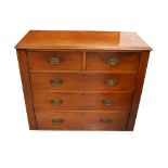 MAHOGANY CHEST with a moulded top, above two short and three long graduated drawers,