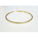 UNMARKED HIGH CARAT GOLD BANGLE 6.4cm interior diameter, approximately 13.
