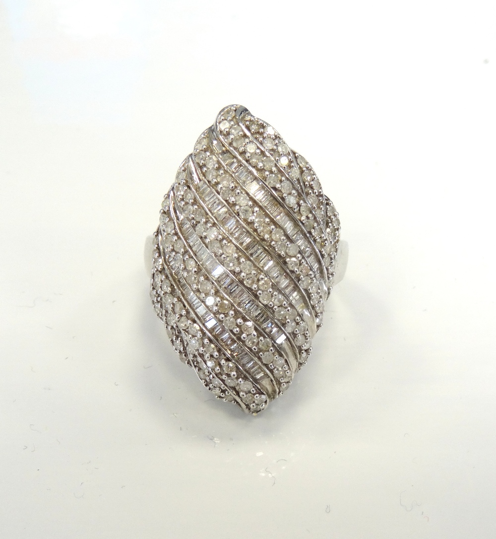 IMPRESSIVE DIAMOND CLUSTER COCKTAIL RING the multi diamonds totalling approximately 2cts,
