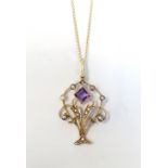 AMETHYST AND SEED PEARL HOLBEIN PENDANT in nine carat gold and on nine carat gold chain