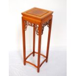 CHINESE HARDWOOD STAND with a square top above a pierced frieze to all sides,