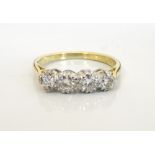 DIAMOND FOUR STONE RING on eighteen carat gold shank with platinum setting,