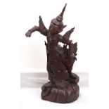 CARVED HARDWOOD FIGURE OF A THAI DANCER with decorative traditional costume, adjustable arms,