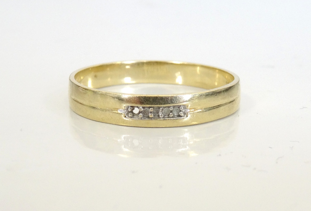 DIAMOND SET NINE CARAT GOLD WEDDING BAND with relief wording to interior 'I Love You',