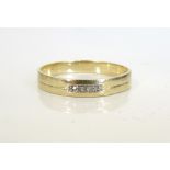 DIAMOND SET NINE CARAT GOLD WEDDING BAND with relief wording to interior 'I Love You',