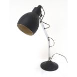 RETRO ANGLE POISE DESK LAMP with a circular black metal weighted base,