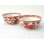 PAIR OF CHINESE PORCELAIN TEA BOWLS circa 1900, with copper red decoration on white ground,