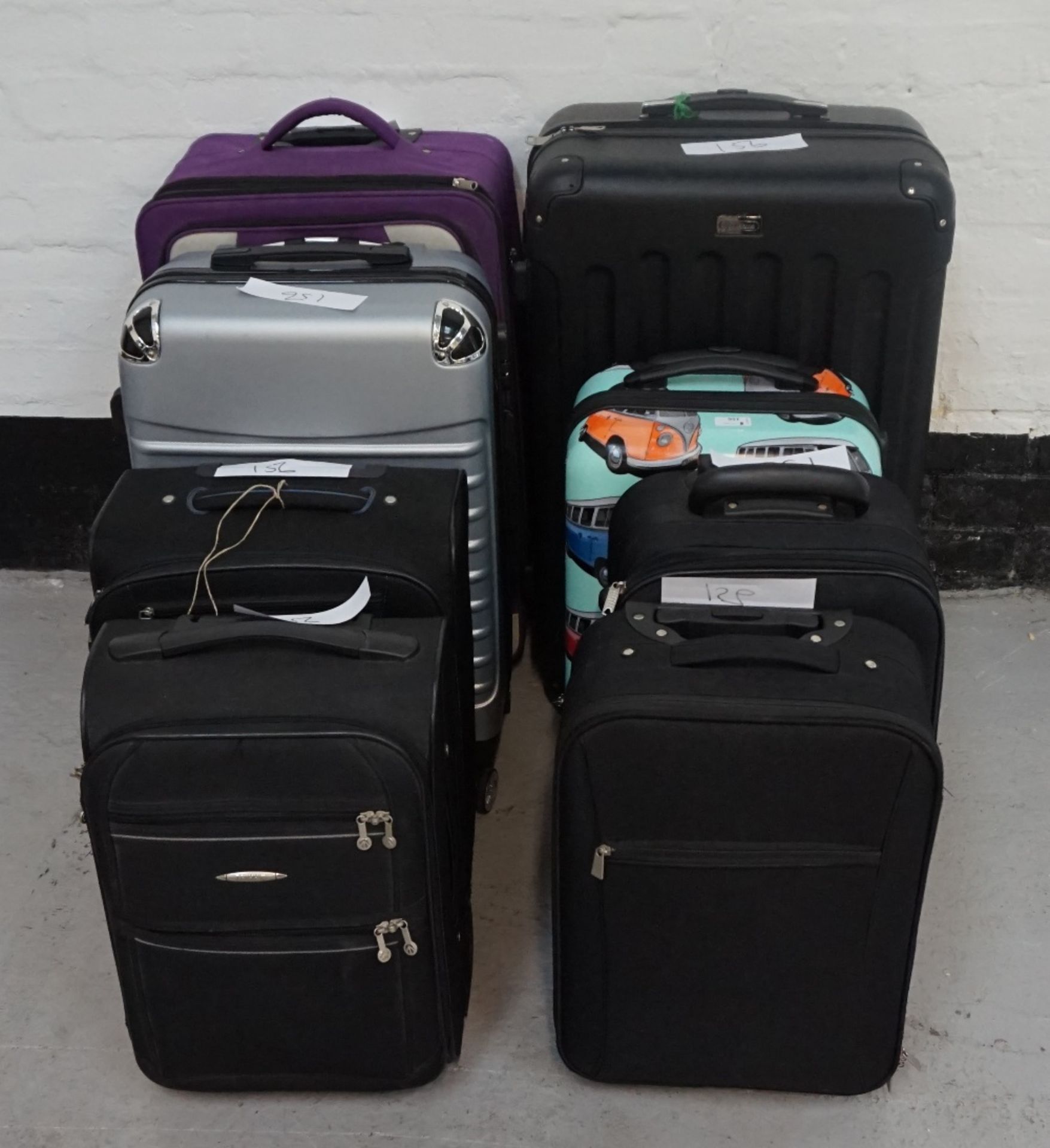 SELECTION OF EIGHT SUITCASES