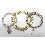 THREE SILVER BRACELETS comprising a heavy silver gilt curb link bracelet;