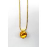 MODERN DESIGNER CITRINE PENDANT the round brilliant cut citrine approximately 5cts,