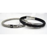 TWO EMPORIO ARMANI BRACELETS one in woven metal and the other rubber,