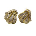 PAIR OF PAVE SET DIAMOND EARRINGS of stylised shell design,