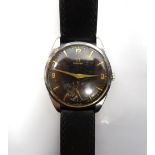 1950's GENTLEMAN'S OMEGA STAINLESS STEEL CASED WRISTWATCH with gold coloured Arabic numerals,