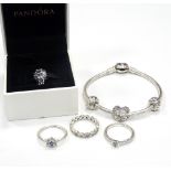 SELECTION OF PANDORA SILVER JEWELLERY comprising a Moments charm bracelet with heart clasp,