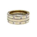 UNUSUAL DESIGNER DIAMOND SET TWO TONE GOLD RING the ring formed with three bands,