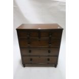 A 19TH CENTURY MAHOGANY CHEST OF DRAWERS the rectangular top with reeded rim above two short and