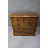 A VICTORIAN MAHOGANY CHEST OF DRAWERS the rectangular top with rounded corners and moulded rim