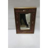 A CONTINENTAL GILT FRAMED MIRROR,