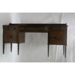 A 19th CENTURY MAHOGANY AND EBONY INLAID SIDEBOARD the rectangular break front top with raised