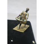 A BRONZE AND POLYCHROME FIGURE, modelled as a waiter shown standing holding a tray, stamped, Gesc...