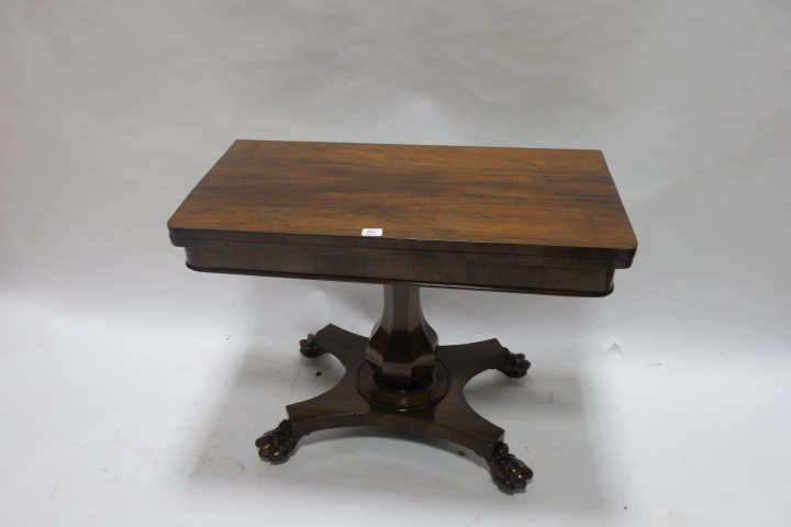 A REGENCY ROSEWOOD FOLD OVER TOP TABLE,