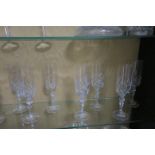 A SET OF TEN WATERFORD CUT GLASS CHAMPAGNE FLUTES