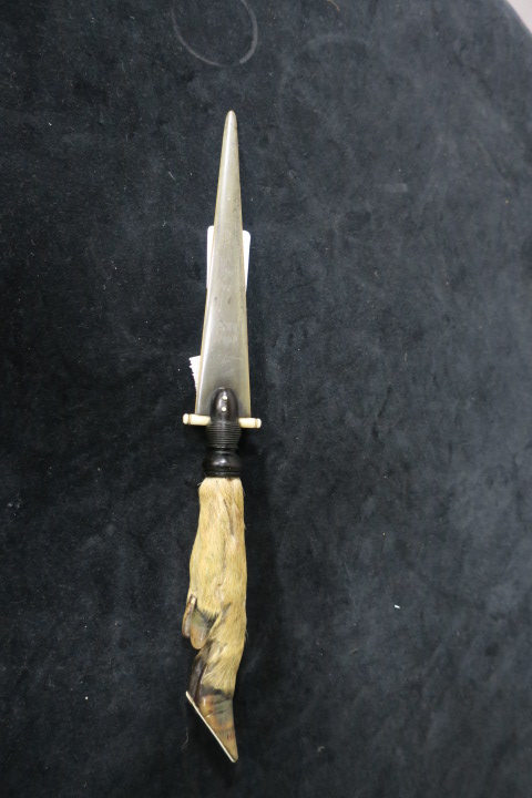 A LETTER OPENER, in the form of a Deer's Foot.