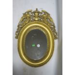 AN EMPIRE STYLE GILT FRAME WALL MIRROR ,