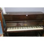 A BANNERMAN MAHOGANY CASED UPRIGHT PIANO, steel frame, 115cms x 134cms x 53cms.