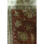 A RECTANGULAR WOOL RUG,