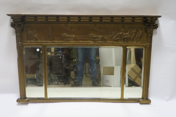 A REGENCY GILTWOOD AND GESSO COMPARTMENT OVERMANTEL MIRROR,