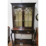 A GEORGIAN STYLE MAHOGANY FRAMED DISPLAY CABINET by Edwards and Roberts the moulded cornice with