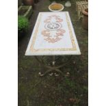 A WROUGHT IRON TABLE, surmounted with an inlaid marble top of rectangular outline,