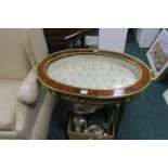 A CONTINENTAL STYLE KINGSWOOD AND GILT BRASS MOUNTED DISPLAY CABINET the two handled oval shaped