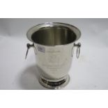 A SILVER PLATED CHAMPAGNE BUCKET engraved Jacques De France on circular foot