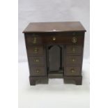 A GEORGIAN STYLE MAHOGANY KNEEHOLE DESK,