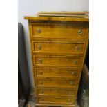 A GEORGIAN STYLE WALNUT TALLBOY, of rectangular form with seven drawers on shaped bracket feet,