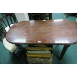 A MAHOGANY TABLE LATE 19TH CENTURY the rectangular top with rounded ends and moulded rim raised on