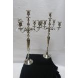 A PAIR OF PLATED FIVE BRANCH TALL CANDELABRA,