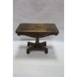 A GEORGE IV ROSEWOOD FOLD OVER CARD TABLE,