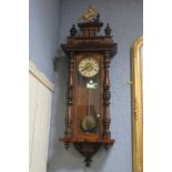 A 19th CENTURY MAHOGANY VIENNA CLOCK,