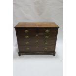 19th CENTURY MAHOGANY CHEST OF DRAWERS the rectangular top above two short and three long cock