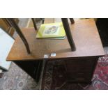 AN OAK CHILDS DESK, with single pedestal and four long drawers on plinth base,